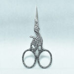 Black Texture Cat Style Embroidery Scissors, 3.5 inches, with powder-coated handle and mirror finish blade, made from forged stainless steel in Pakistan.