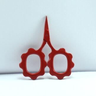Red colored sunflower-shaped embroidery scissors made of stainless steel, designed for precise cutting and decorative crafting.
