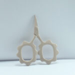 Sunflower-shaped embroidery scissors in sunkist powder coating, 2.5'' forged stainless steel, ideal for precise cutting and decorative stitching.