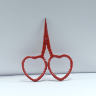 2.5-inch red heart-shaped embroidery scissors made from stainless steel, perfect for thread cutting and small needlework tasks.
