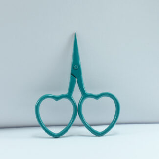 2.5-inch teal green heart-shaped embroidery scissors with stainless steel blades, designed for fine thread cutting and embroidery work.