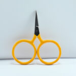 2.5-inch Big Ring Tiny Scissors with half yellow handle and stainless steel blades, large finger holes for embroidery, sewing, and craft cutting.